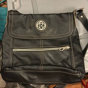 Gently used black faux leather , crossbody
